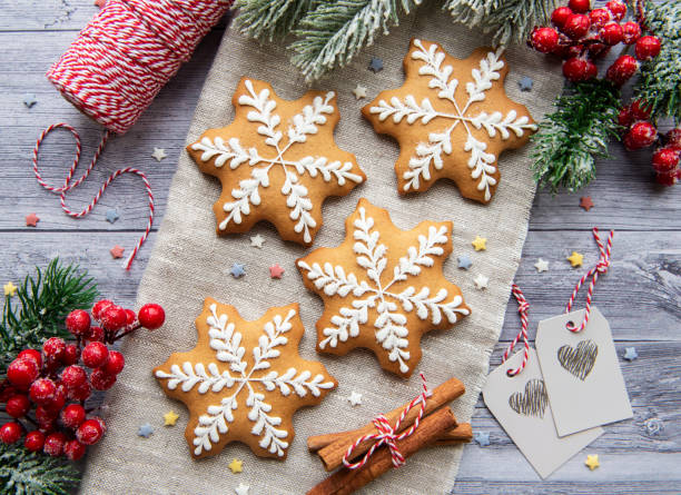 istock Christmas gingerbread cookies on dark background 1353549491