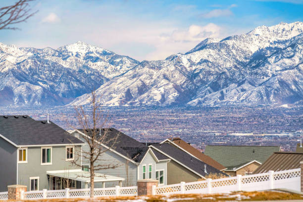 istock Residential landscape with Wasatch Mountains and valley scenery in background 1353551845