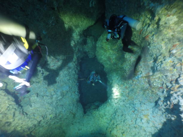 istock Scuba diving at Blue Hole in Palau 1353554203