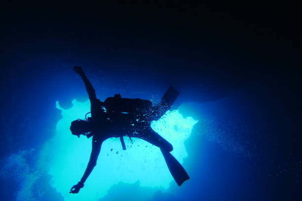 istock Scuba diving at Blue Hole in Palau 1353554253