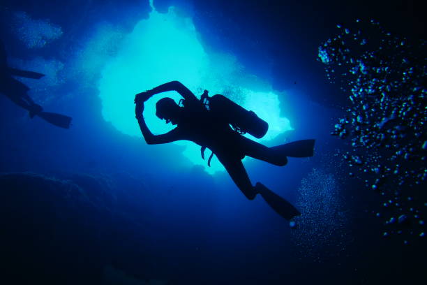 istock Scuba diving at Blue Hole in Palau 1353554305