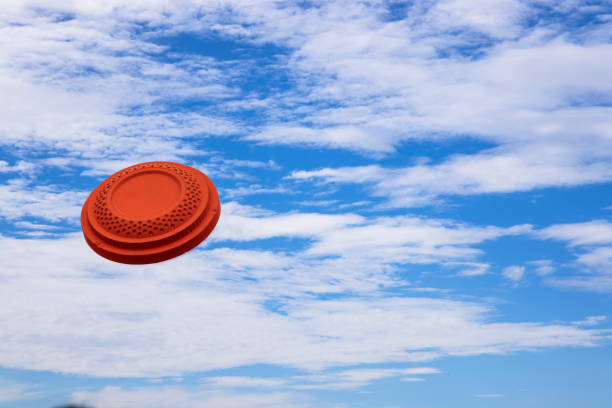 Clay disc shooting target on the blue sky , Can be used as a background Clay disc shooting target on the blue sky , Can be used as a background trap shooting stock pictures, royalty-free photos & images