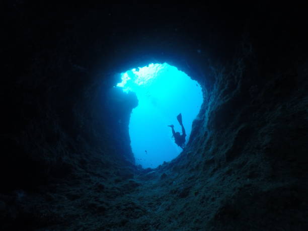 istock Scuba diving at Blue Hole in Palau 1353554417