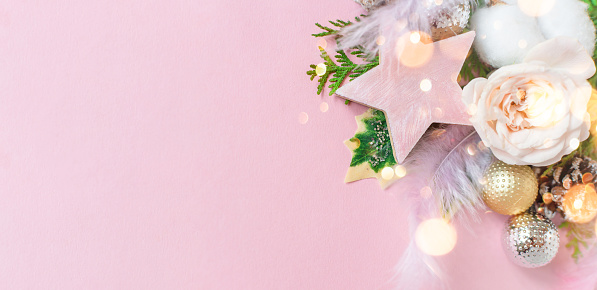 Christmas banner pink composition. Pink christmas gifts, fir branches Christmas, new year concept, winter concept.
