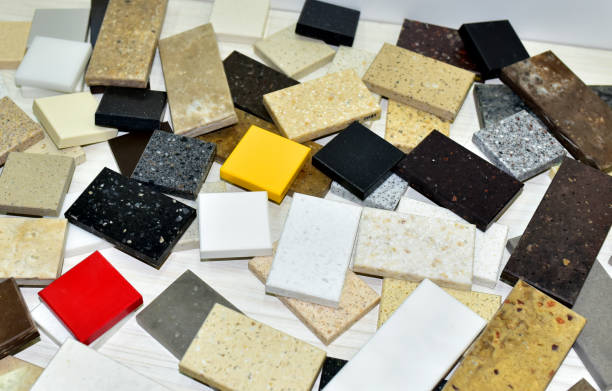 istock Samples of acrylic artificial stone for countertops. Artificial stone for interior decoration in the construction in houses. 1353555752