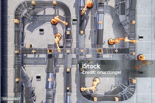 istock Top View Of Robotic Arms Working On Conveyor Belt In Automatic Warehouse 1353561607
