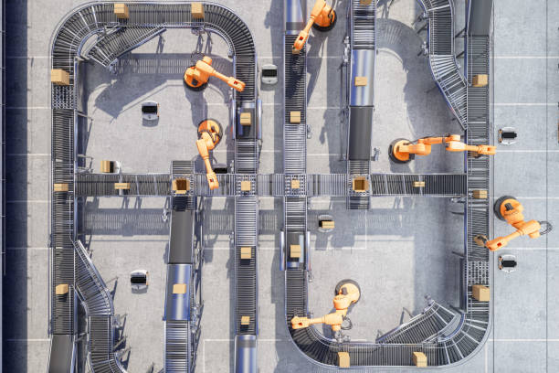 Artificial Intelligence in Retail: The Future of Customer Experience 3 top view of robotic arms working on conveyor belt in automatic warehouse