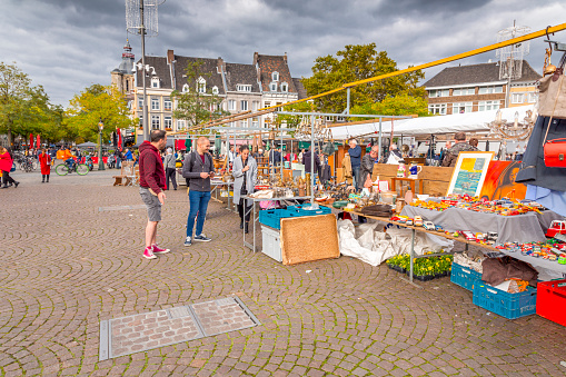 Maastricht, Holland - October 16, 2021: Second hand and antiquity market at Vrijthof Square in Maastricht, the capital of Limburg province of the Netherlands.
