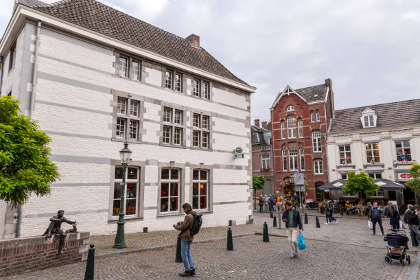 Maastricht, Holland - October 16, 2021: Typical Dutch architecture and street view in Maastricht, a city in Limburg, the Netherlands.