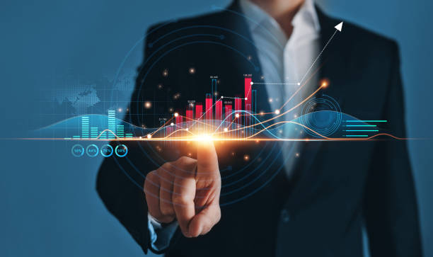 istock Businessman hand draws growth business graph progress and financial analyzing. Business development to success, profit and growing plan 1353563040