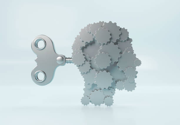 Human head made of gears and Winder. Working people concept.
