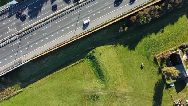 Highway, with next to it a grass field