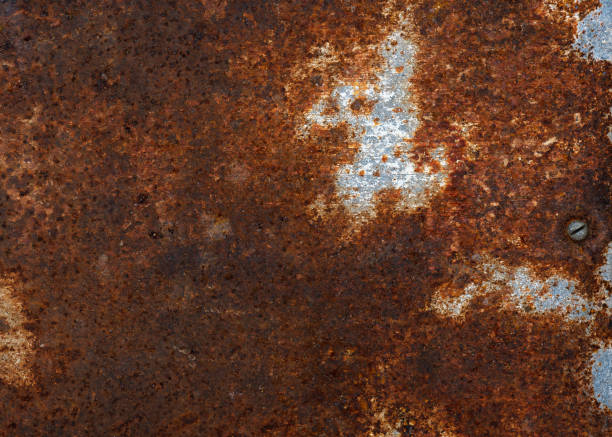 antiga textura de metal escuro abstrato coberto com ferrugem para design de fundo - rust - fotografias e filmes do acervo
