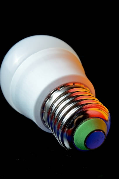 istock New LED lamp with e14 base. highlighted in different colors. 1353570775