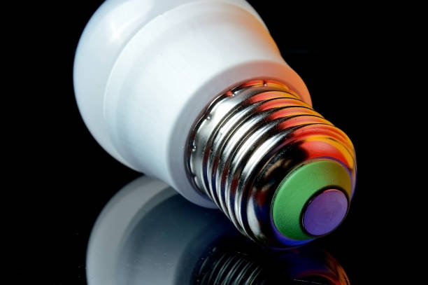 istock New LED lamp with e14 base. highlighted in different colors. 1353570800