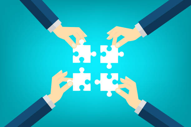 istock Teamwork. Business concept. Team connecting puzzle elements. Symbol of teamwork, cooperation, partnership. Vector illustration 1353572354