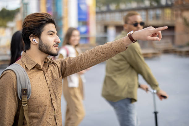 istock Students walking on territory of university campus 1353572552