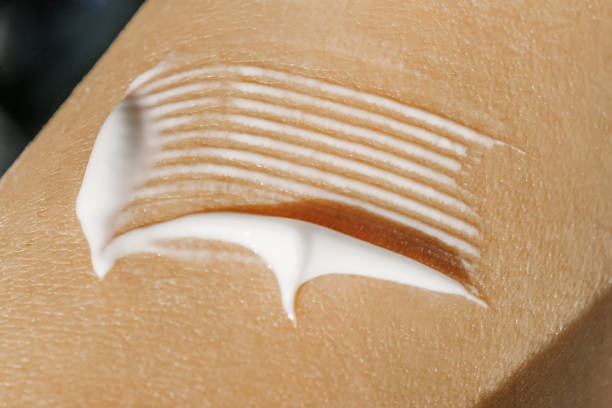 istock The texture of the white cream on the skin. 1353572995
