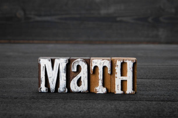 Math. Education, skills and science and physics concept. Word on a wooden background Math. Education, skills and science and physics concept. Word on a wooden background. Math Aptitude Test stock pictures, royalty-free photos & images