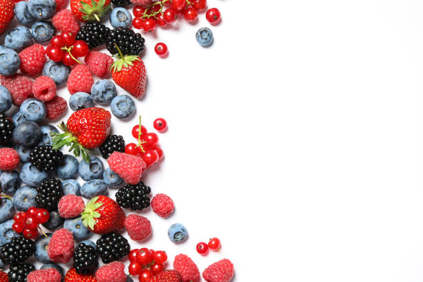 istock Mix of fresh berries on white background, flat lay 1353575784