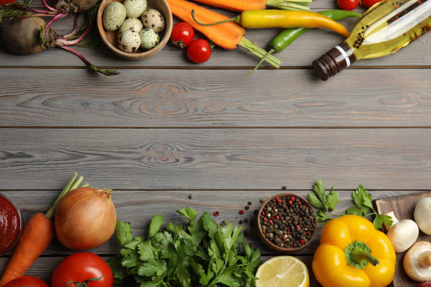 istock Flat lay composition with ingredients for cooking on wooden table. Space for text 1353578470