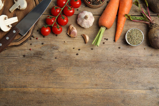 istock Flat lay composition with ingredients for cooking on wooden table. Space for text 1353578641