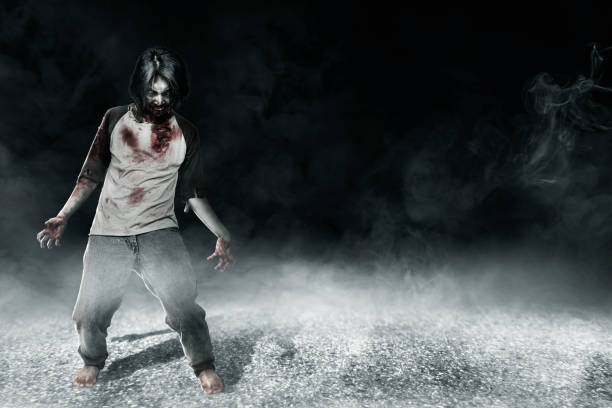 istock Scary zombies with blood and wound on his body standing 1353580911