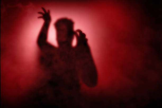 istock Silhouette of a scary zombie 1353580941