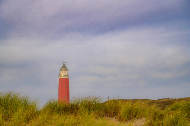 istock Texel lighthouse in the dunes during a stormy autumn night 1353581954