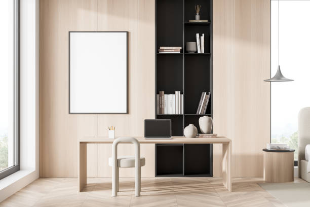 istock Bright living room interior with empty white poster, desk, laptop 1353582076