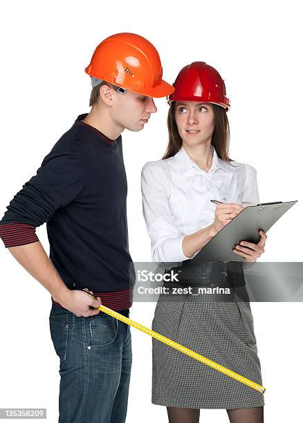 Foto de Arquitetos Em Hardhats Bem e mais fotos de stock de Adulto - Adulto, Artigo de vestuário para cabeça, Capacete - Equipamento