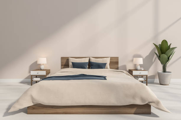 istock Stylish beige bedroom with blue details 1353582961