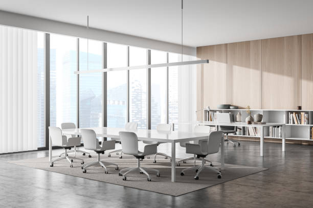 istock Stylish white meeting table in panoramic CEO office. Corner view. 1353583537