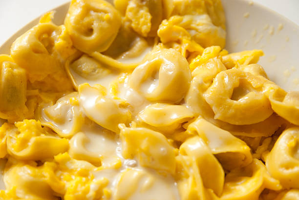 salad dish of Bolognese's Tortellini with pastry. Horizontal Image.
