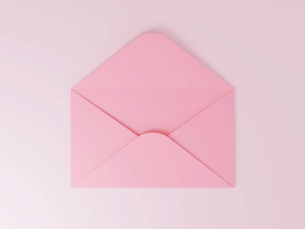 istock Open pink envelope with blank card on pink background 1353590282