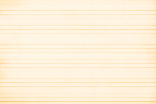 Horizontal shaped grunge lined pastel cream coloured paper sheet. The lines are faded brown in color. The paper sheet can be used by kids as page of notebook. There is copy space, no people and no text. Can be used as posters banners or backdrops templates.