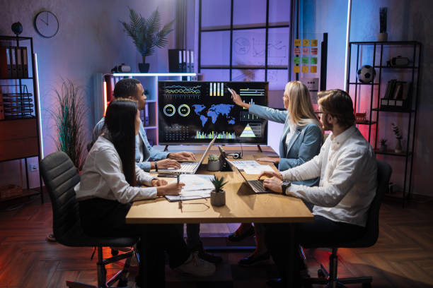 istock Multiracial partners discussing financial project at office 1353593252
