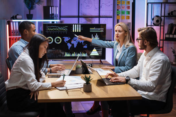 istock Multiracial partners discussing financial project at office 1353593268