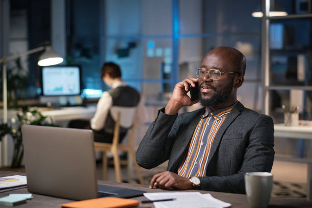istock Businessman talking on the phone 1353593288