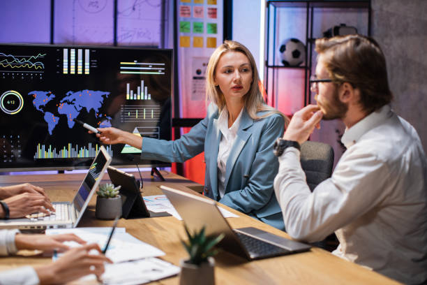 istock Multiracial financial analysts working together at office 1353593353