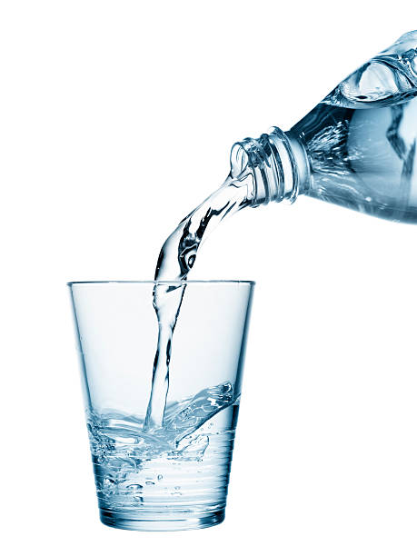 istock pouring mineral water in a glass 135359347