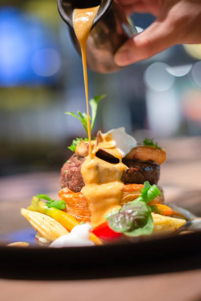 istock Grilled foie gras topped on grilled tender beef 1353594924