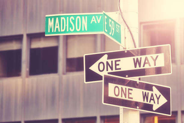 istock One Way traffic signs at Madison Avenue. 1353595000