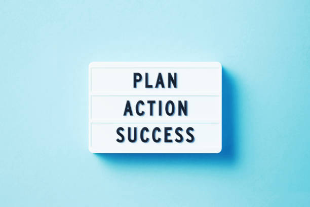 istock Plan Action Success Written White Lightbox Sitting On Blue Background 1353596047