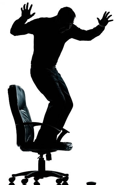 istock one business man afraid of computer mouse silhouette 135359616