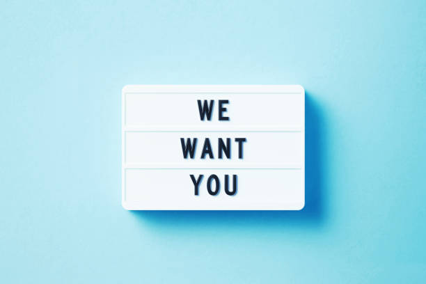 istock We Want You Written White Lightbox Sitting On Blue Background 1353596229