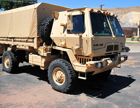 Cañon City, Fremont County, Colorado, USA: Medium Tactical Vehicle derived from an Austrian design (Steyr 12 M 18) - Oshkosh-produced M1078 A1P2 5-ton MTV, LMTV Standard Cargo Truck - near the State Armory.