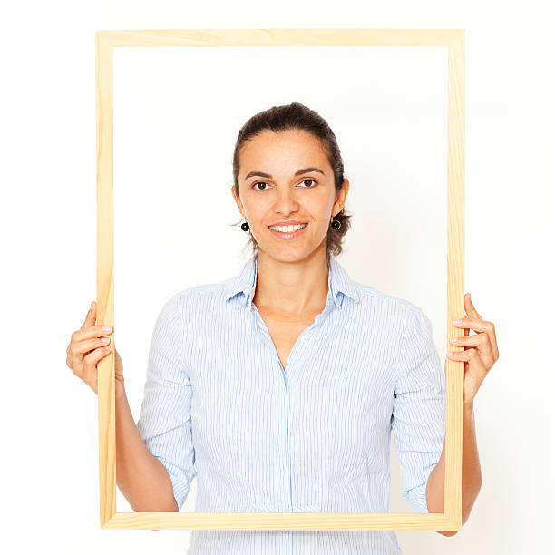istock Pretty woman with a big yellow frame 135359671