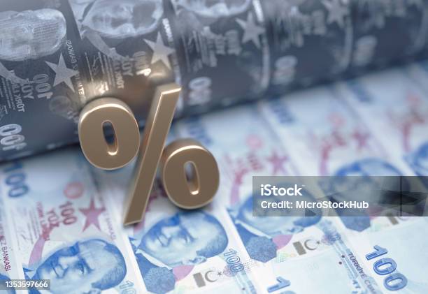 Gold Colored Percentage Sign Sitting Over Turkish Lira Bills Stock Market And Finance Concept Stock Photo - Download Image Now