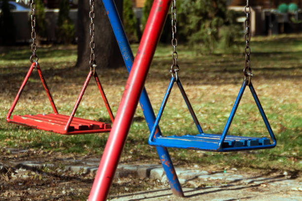 istock Blue and red children's swing. 1353598716